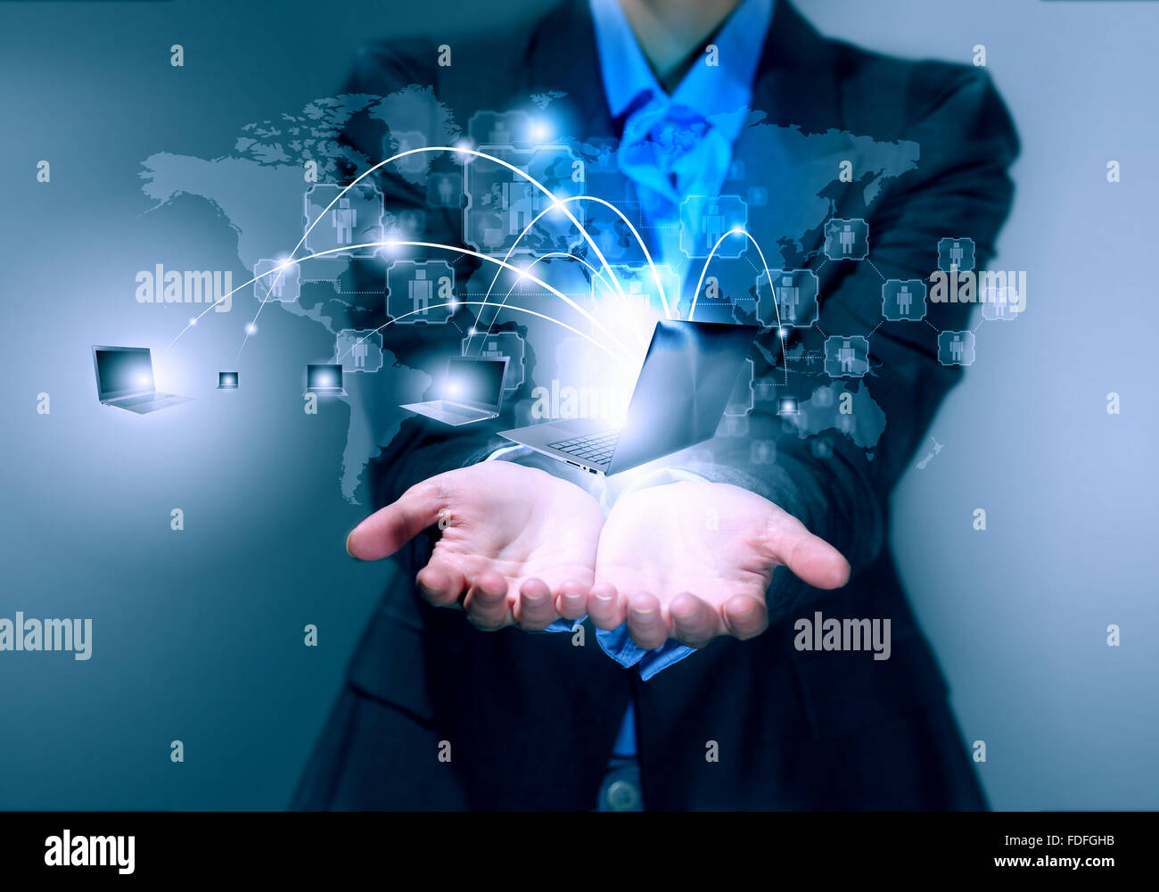 Image of business person holding devices in hands Stock Photo Alamy