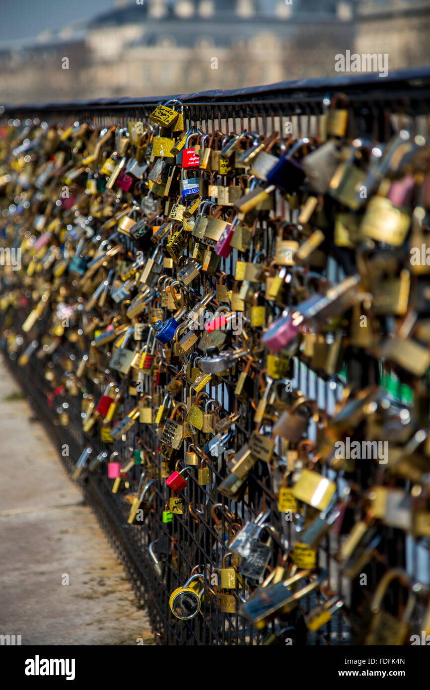 Padlocks placed on Lock Bridge in Paris, France. A symbol of