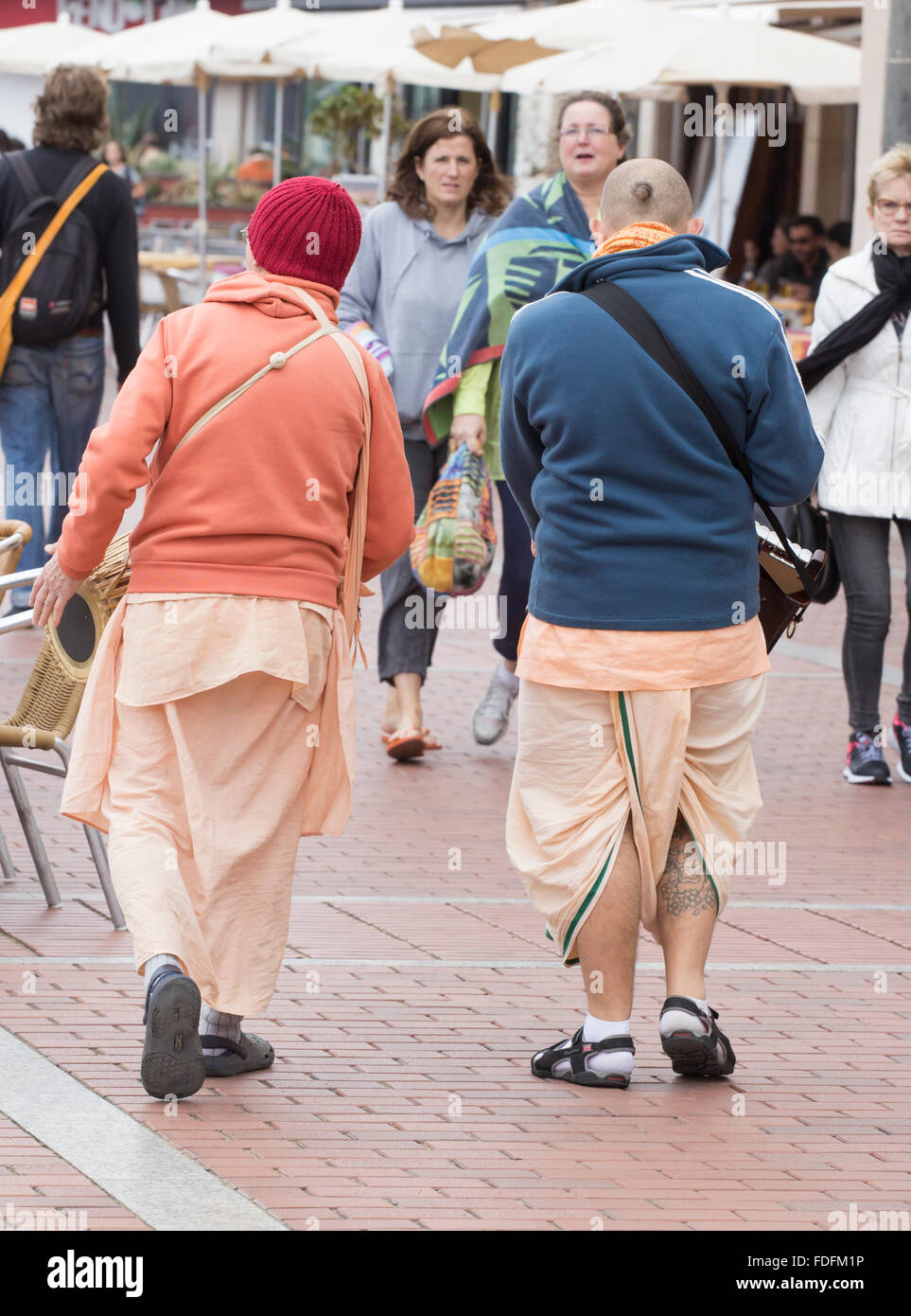 Hare Krishna singings march through the street Stock Photo - Alamy