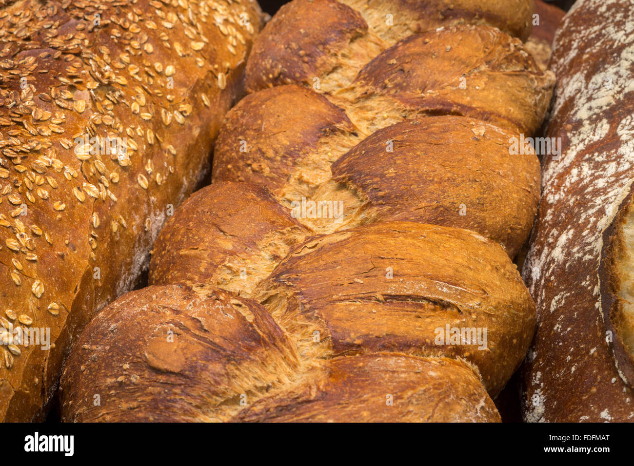 Different kinds of bread on display in a bakery (France). Variety of