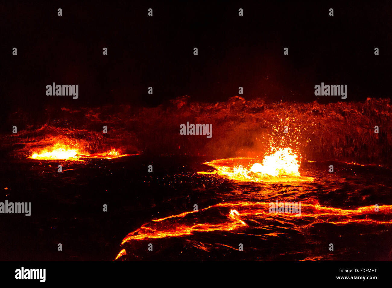 Lava bubbles burst on the surface of the Erta Ale lava lake, Ethiopia Stock Photo