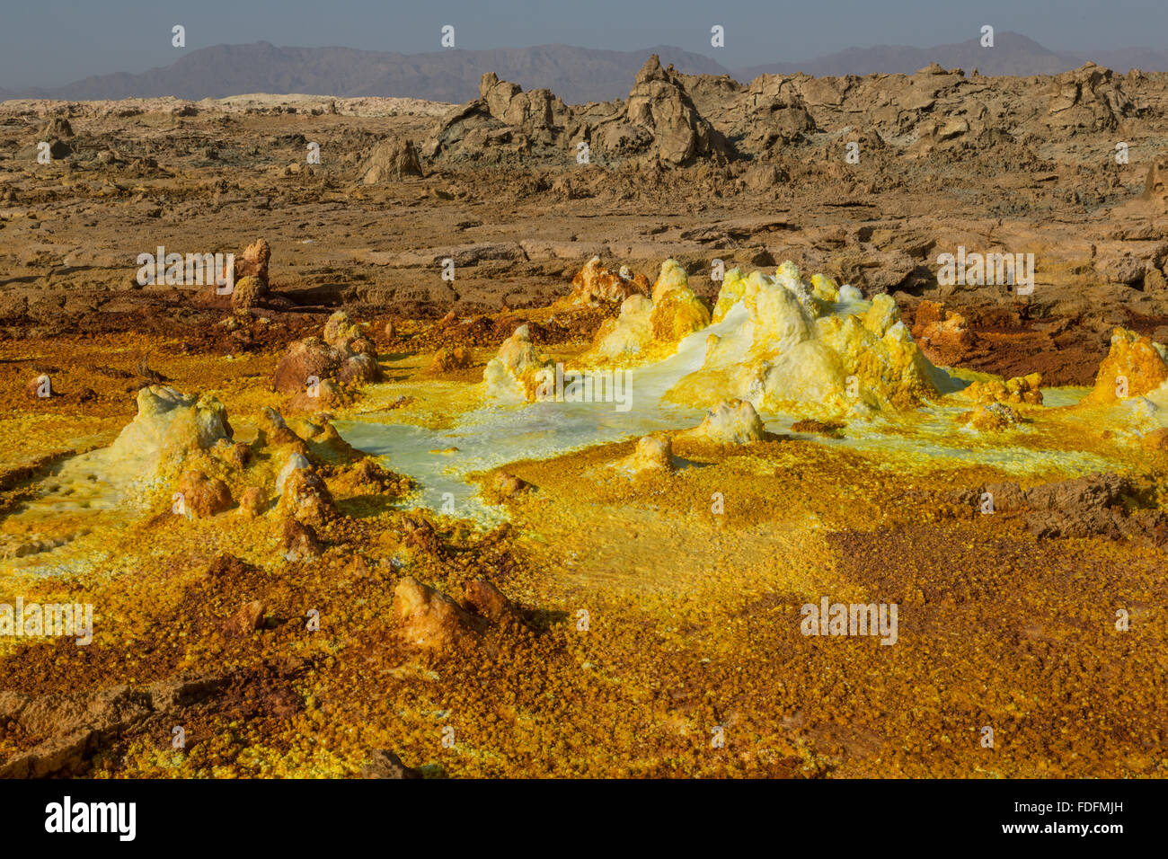 Dried sulphur pools on the summit of Dallol salt volcano, Ethiopia Stock Photo