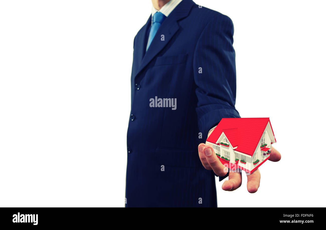 Close up of businessman holding house model in palm Stock Photo - Alamy