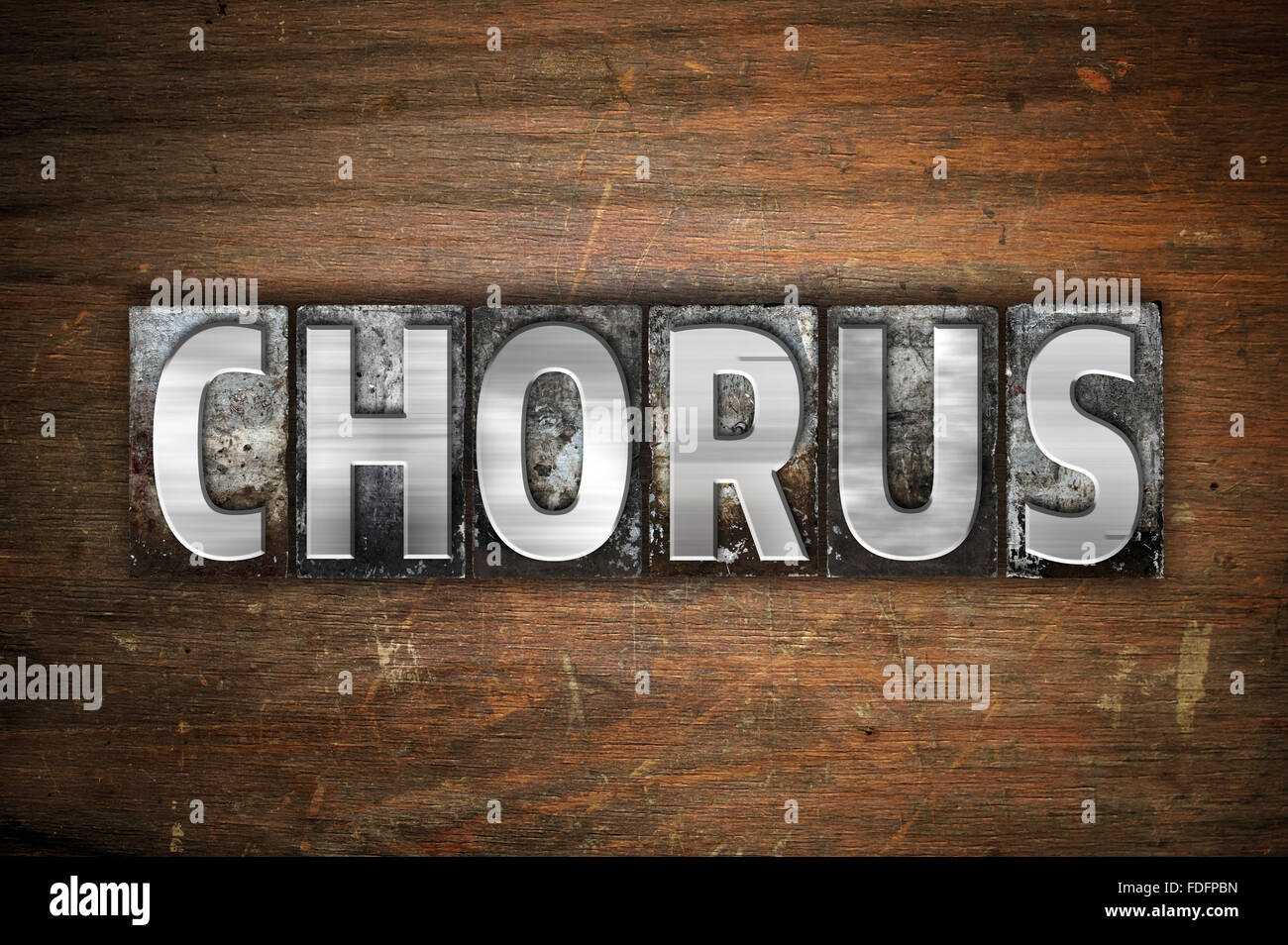 The word "Chorus" written in vintage metal letterpress type on an aged