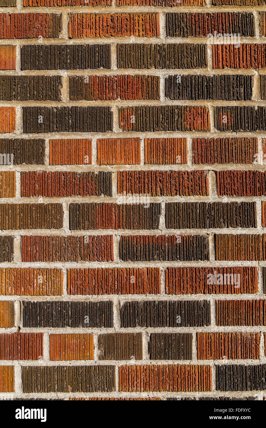 Multi coloured brick wall background and texture. Different bricks can ...