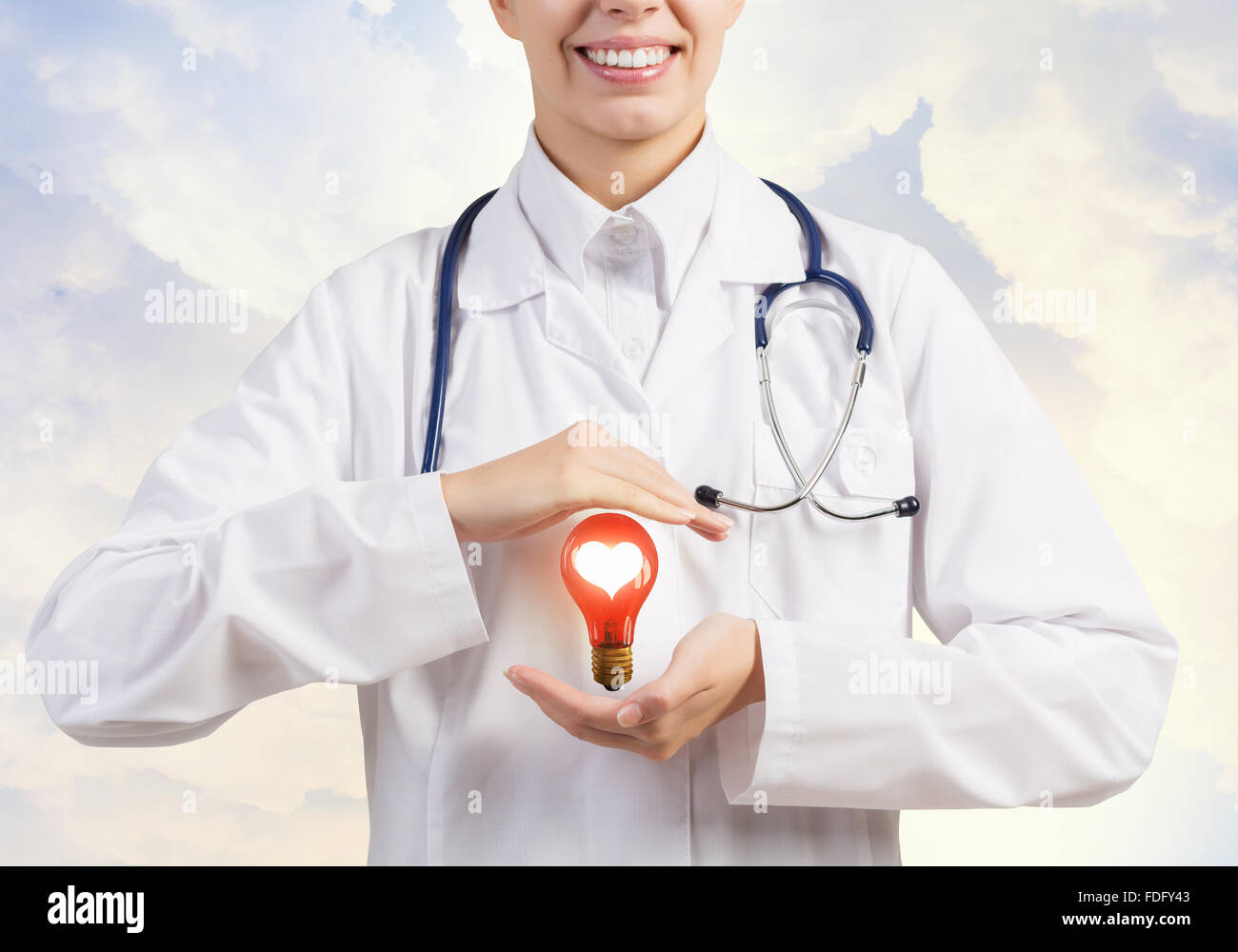 Close up of female doctor holding heart in hands Stock Photo - Alamy
