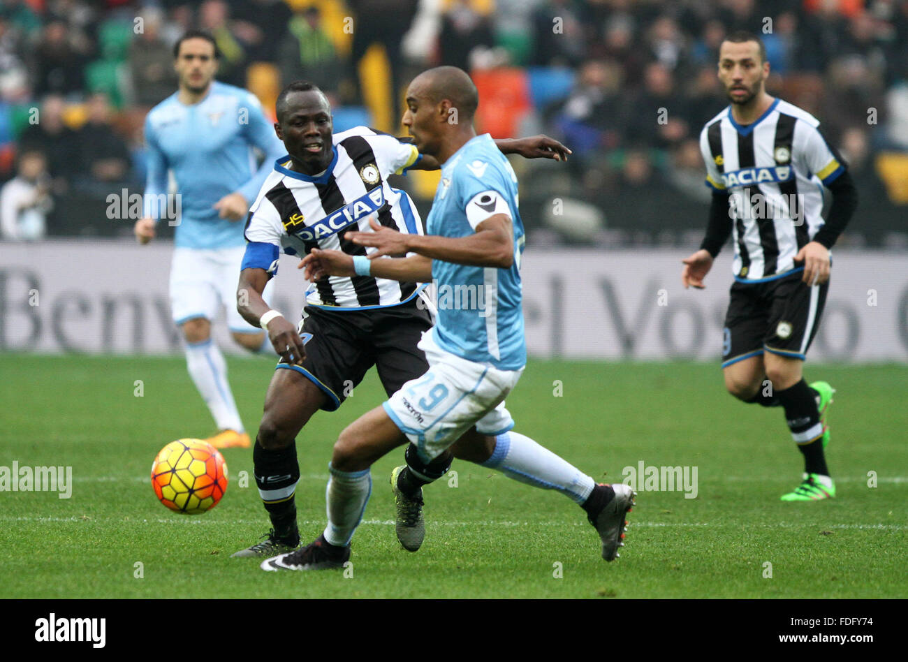 Udine, Italy. 31st January, 2016. Udinese's midfielder Emmanuel Agyemang Badu (L) Lazio's defender Abdoulay Konko fights for the ball during the Italian Serie A football match between Udinese Calcio v SS Lazio. Credit:  Andrea Spinelli/Pacific Press/Alamy Live News Stock Photo