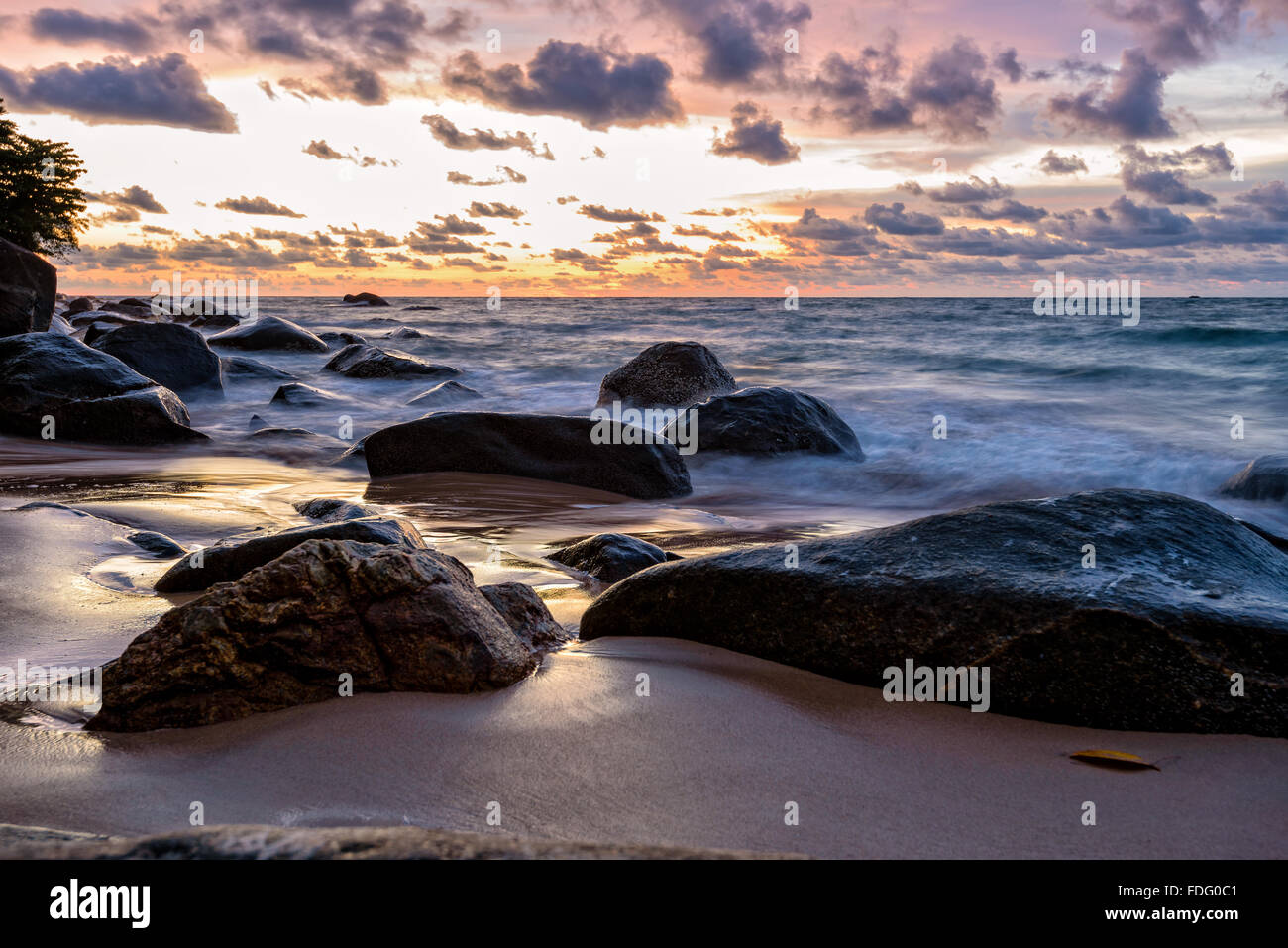 Beautiful landscape of sky and clouds above the sea during sunset at Khao Lak Beach in Khao Lak-Lam Ru National Park, Takuapa Stock Photo