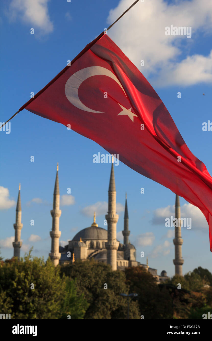 Blue Mosque with Turkish flag view from M. Arkif Ersoy Sultanahment Park Istanbul Turkey Stock Photo