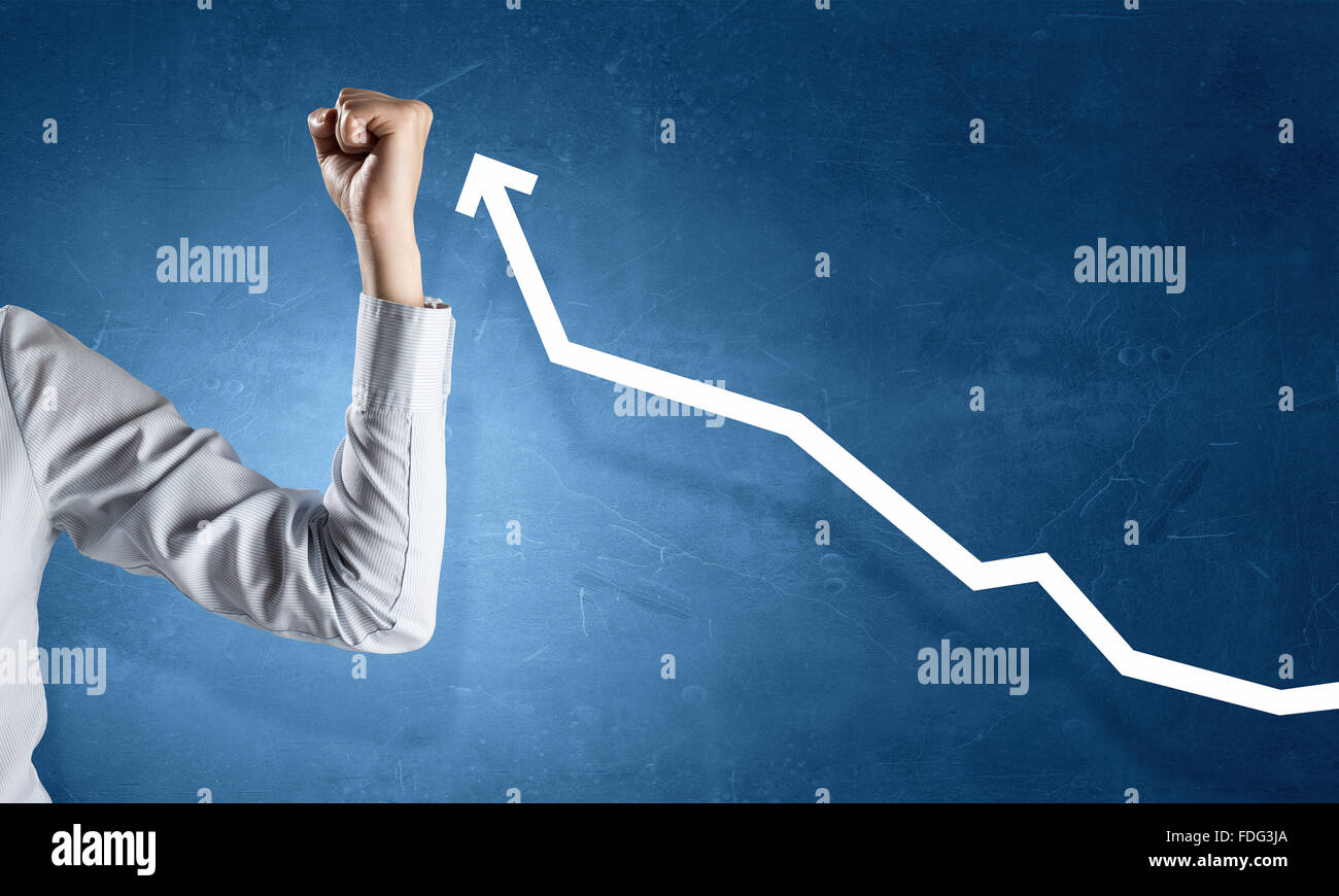 Hand showing power concept and growing graph Stock Photo - Alamy