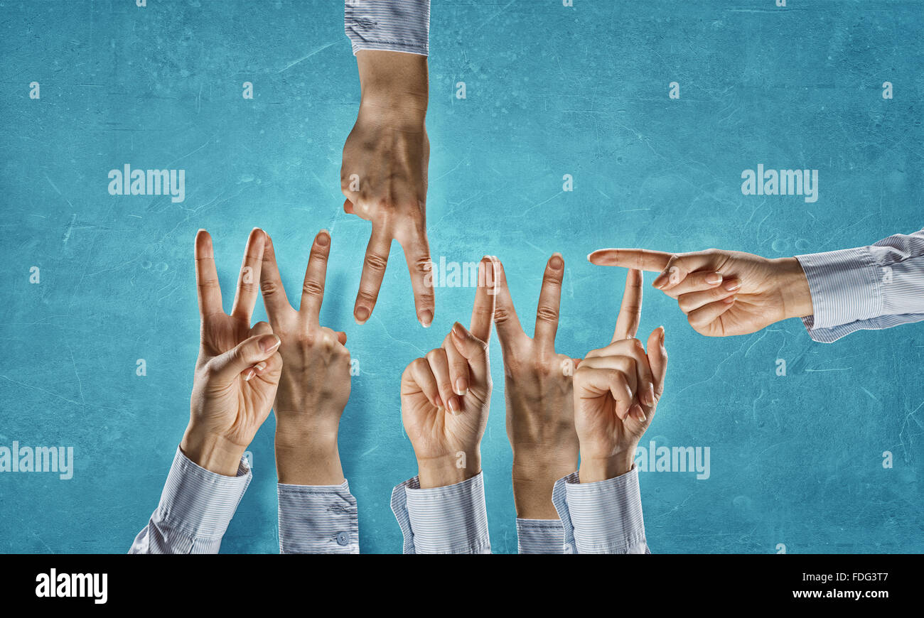 Word hands team people letters hi-res stock photography and images - Alamy