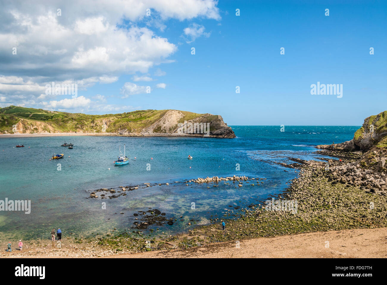 Lulworth Cove and the village of West Lulworth, Jurassic Coast World Heritage Site, Dorset, England Stock Photo