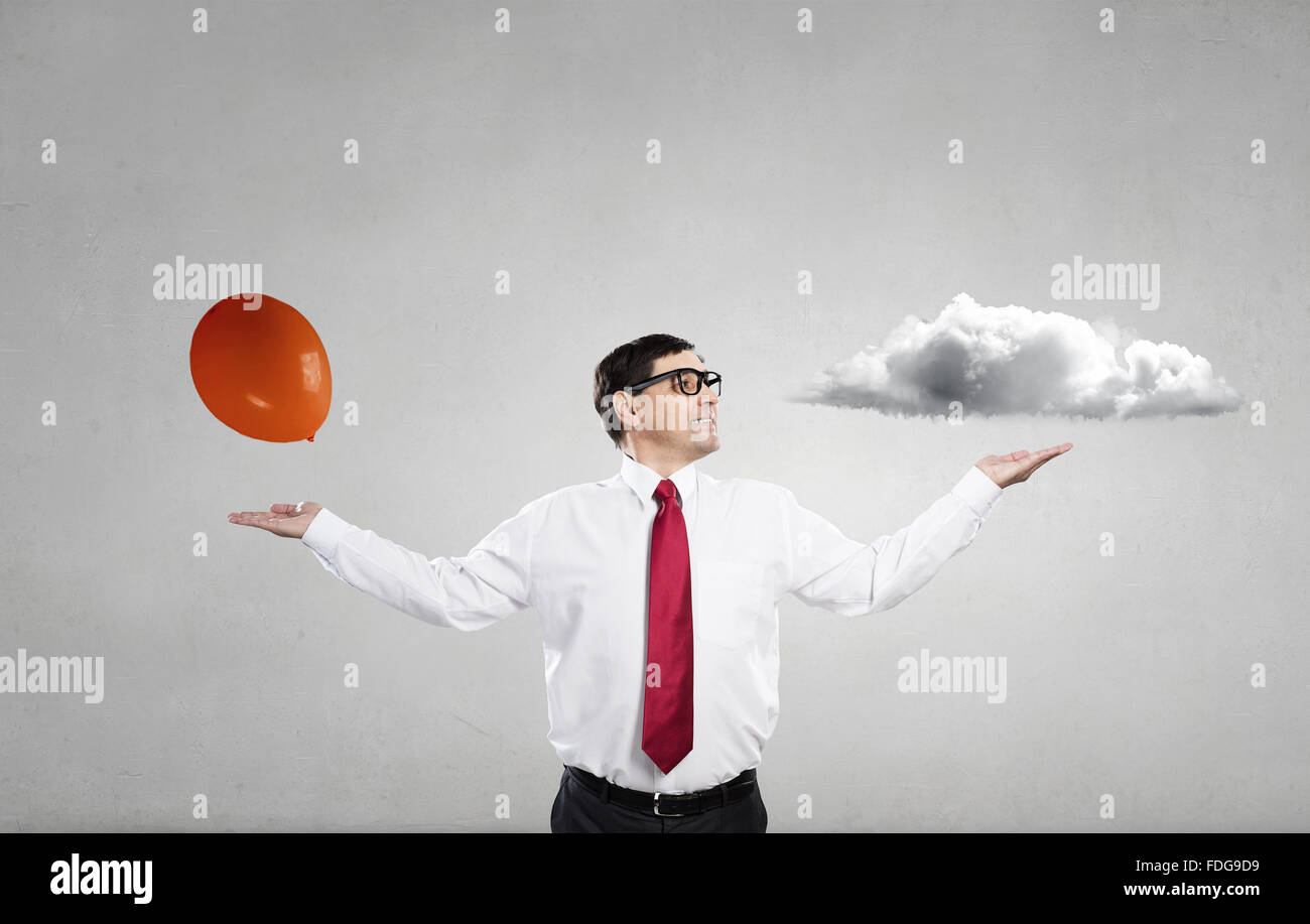 Confident businessman with hands spread apart on Stock Photo Alamy