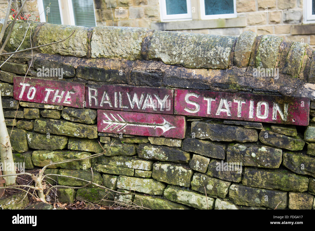 To the railway station sign in the village of Haworth, West Yorkshire, England, UK Stock Photo