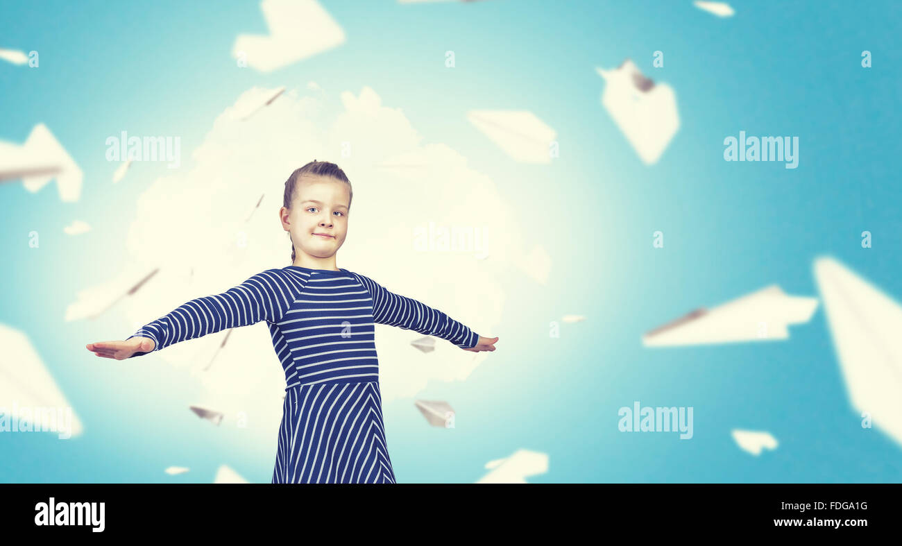 Cute girl and paper planes flying aound Stock Photo - Alamy