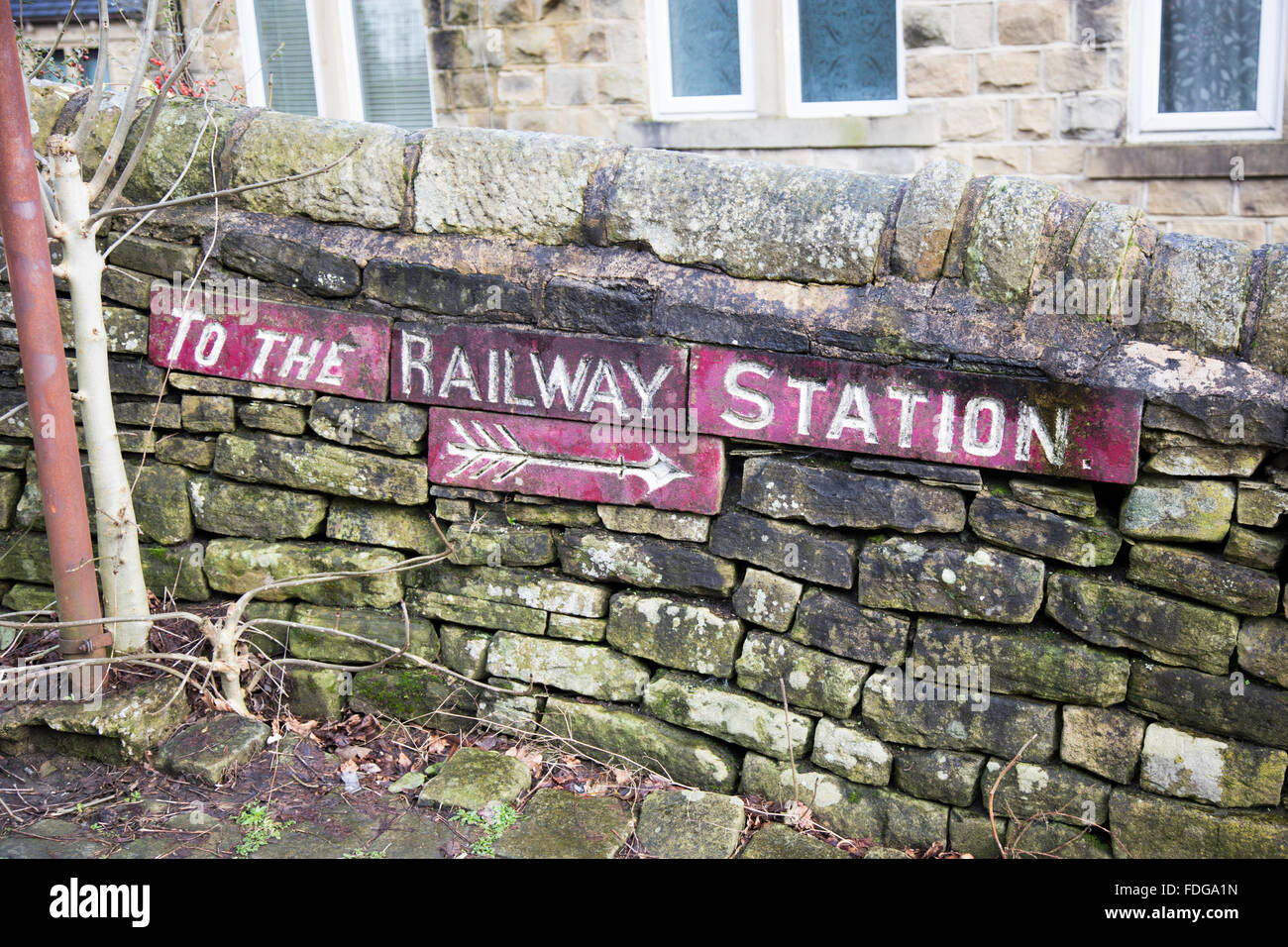 To the railway station sign in the village of Haworth, West Yorkshire, England, UK Stock Photo