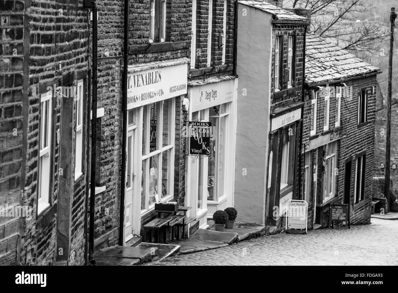The main street in the village of Haworth, West Yorkshire, England, UK Stock Photo