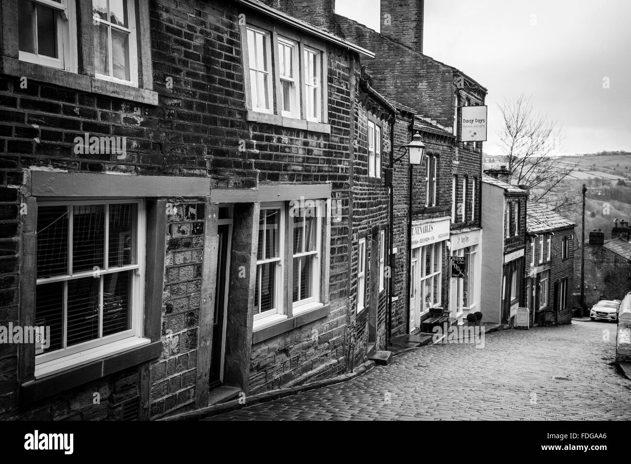 The main street in the village of Haworth, West Yorkshire, England, UK Stock Photo