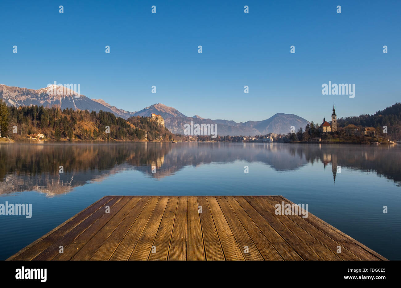 A wooden dock, pier, on a lake Stock Photo - Alamy