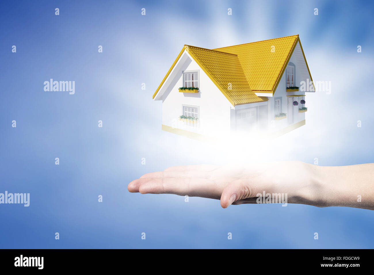 Human hands holding model of dream house Stock Photo - Alamy
