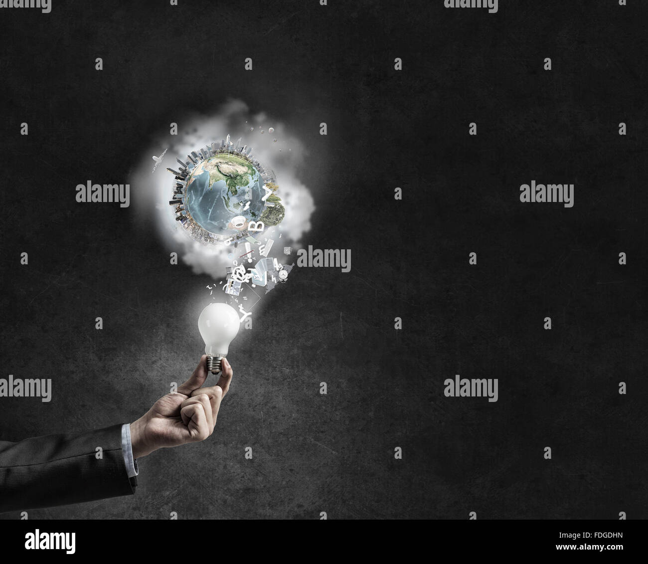 Businessman hand holding glowing light bulb. Elements of this image are ...