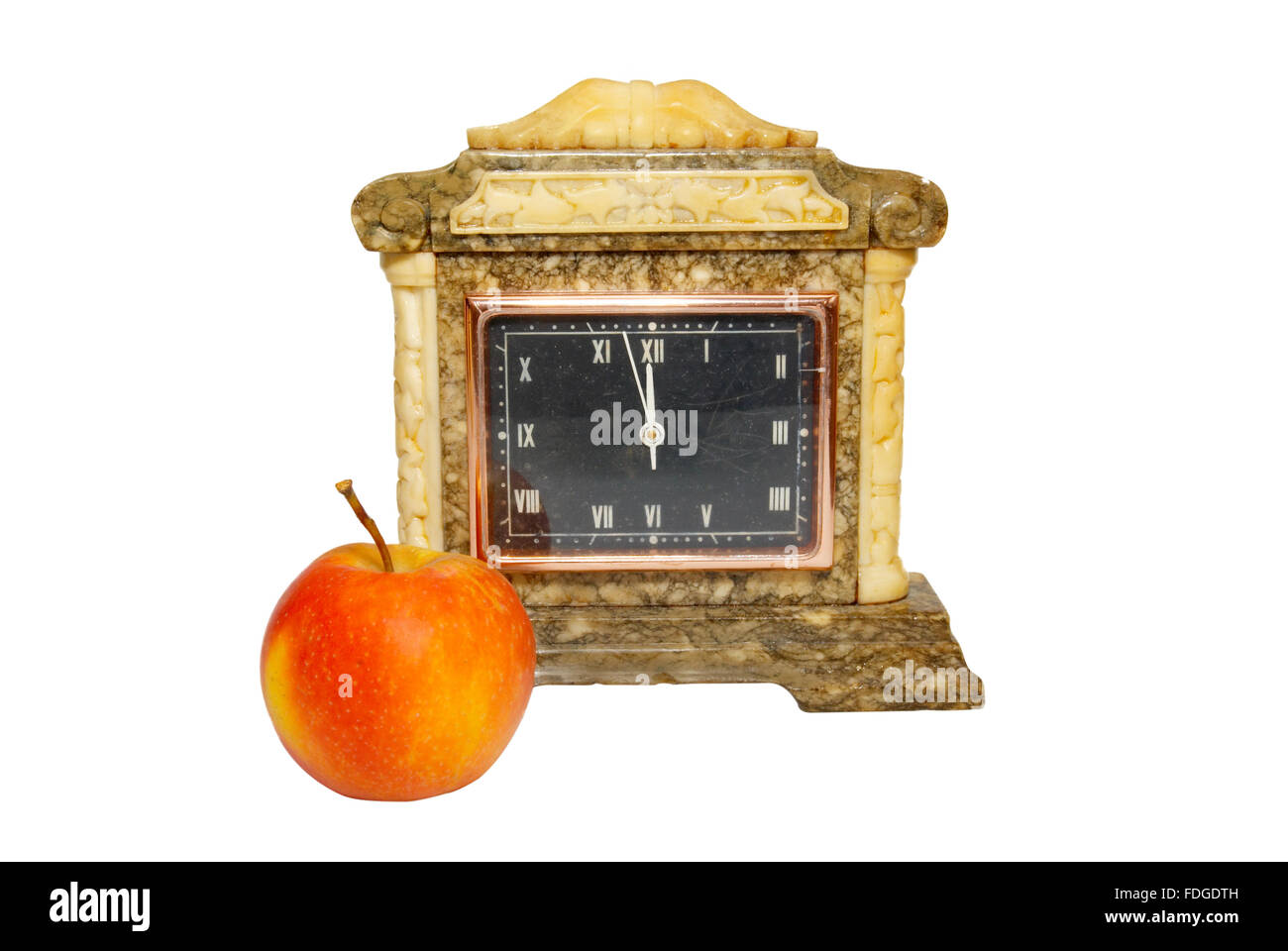 Old table clock and apple isolated on white Stock Photo - Alamy