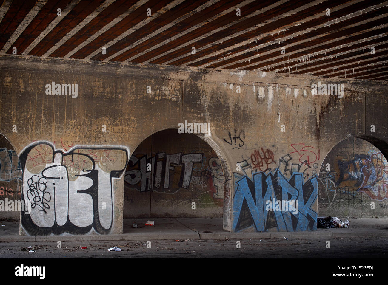 Graffiti found under a viaduct in Milwaukee Junction Detroit Stock Photo
