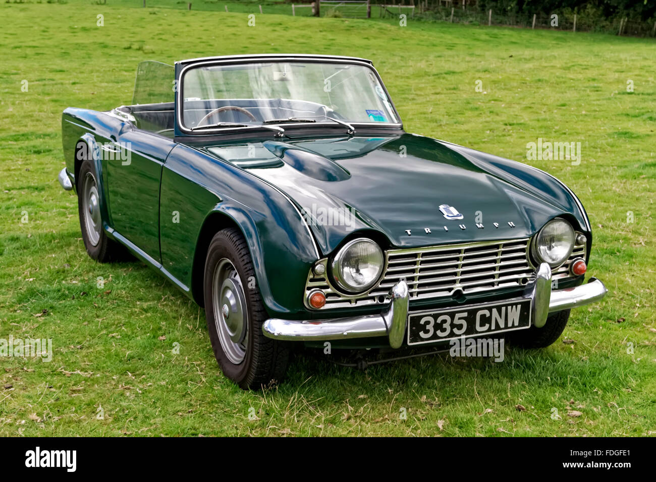 A British Manufactured Triumph Tr4 2 Door Roadster Sports Car At The