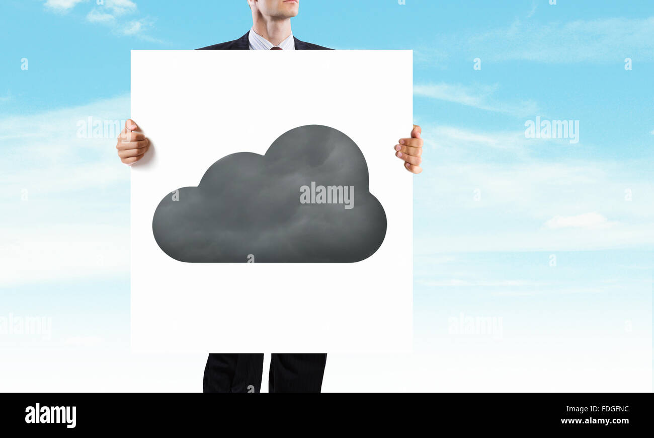 Businessman holding banner with cloud computing concept Stock Photo - Alamy