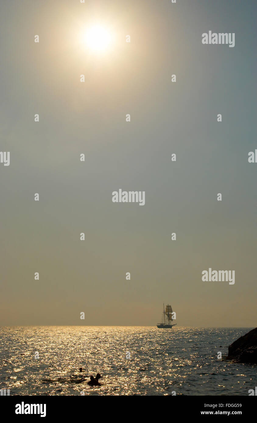 Sailing ship on horizon Stock Photo - Alamy