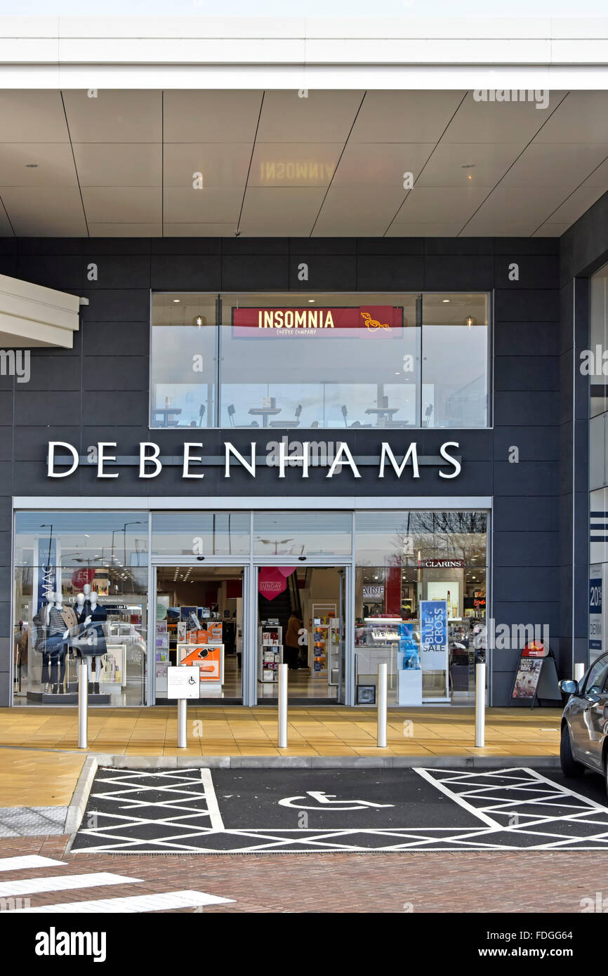 Debenhams department store disabled car parking bay main entrance with Insomnia coffee shop at first floor in Elliotts Field retail park Rugby town UK Stock Photo