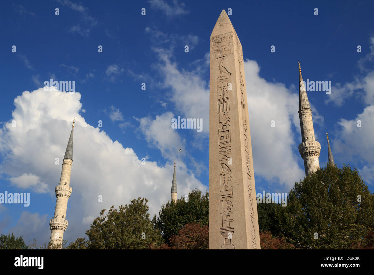 The Obelisk of Theodosius and Blue Mosque Towers in Istanbul, Turkey Stock Photo