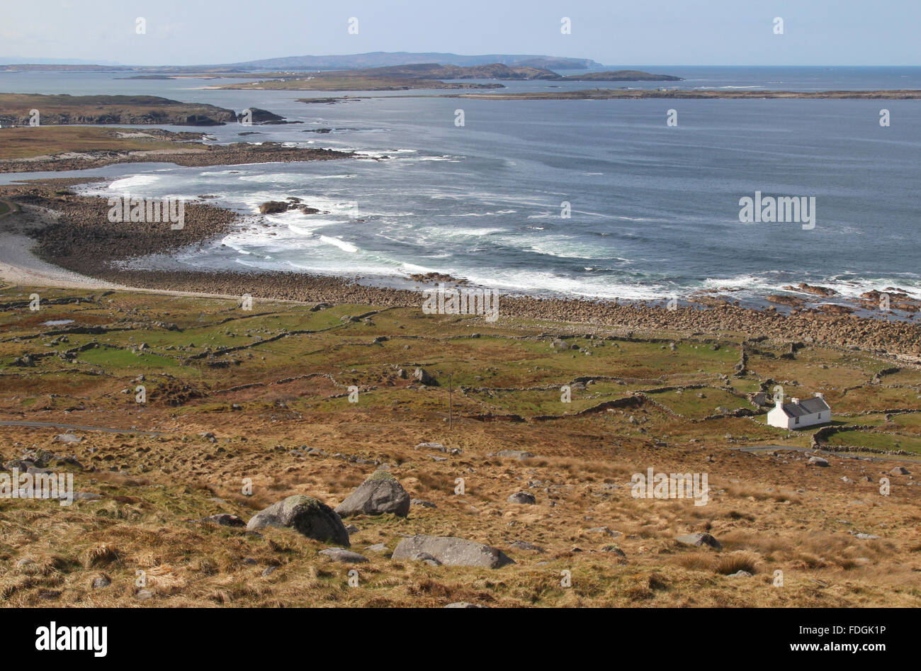 Atlantic shoreline and seaside cottage, County Donegal, Ireland. Stock Photo