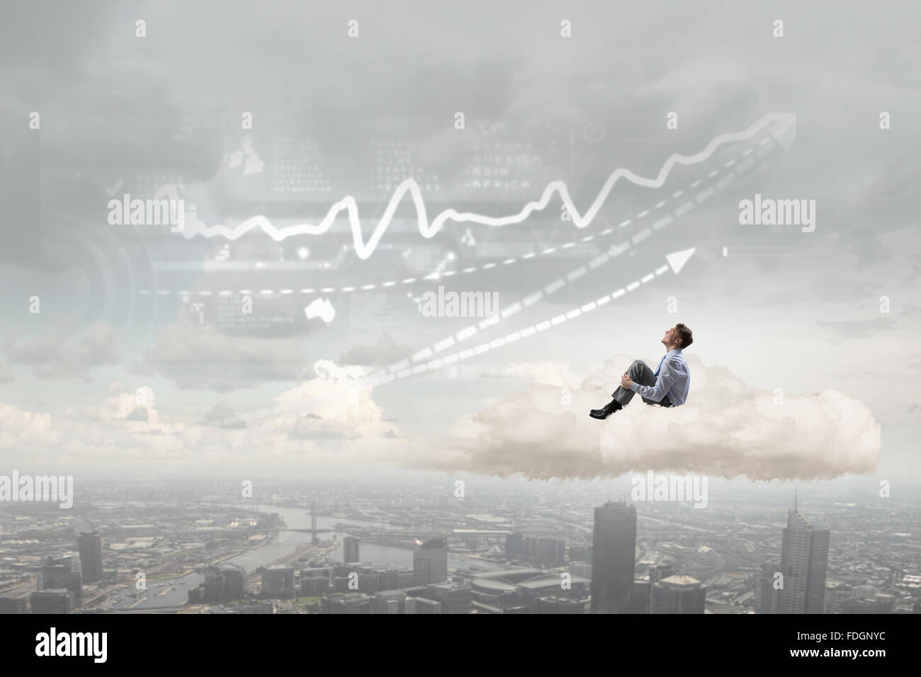 Smiling young businessman sitting alone on cloud high in sky Stock ...