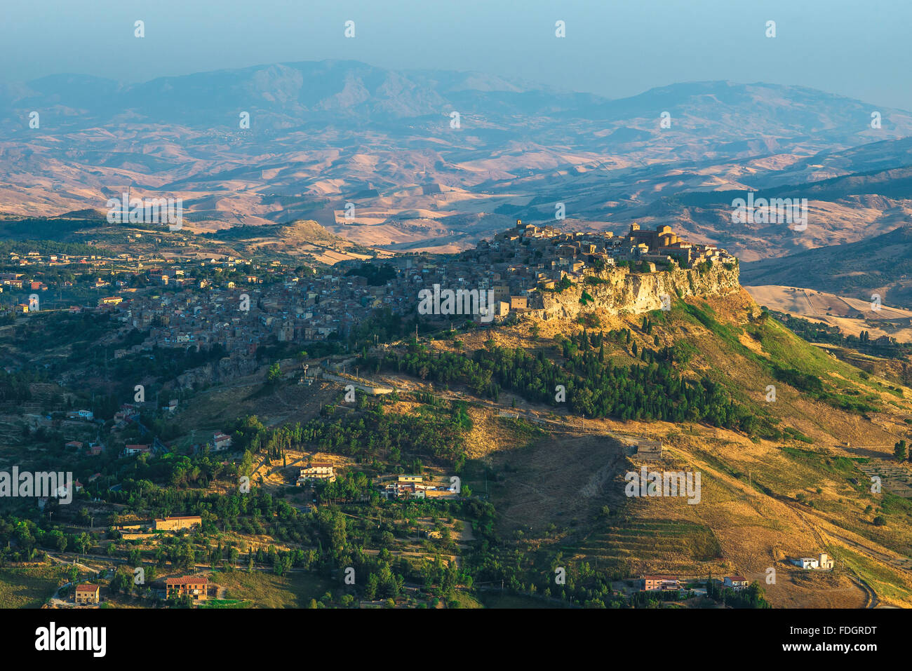 Calascibetta Sicily, aerial view at sunrise of the historic hill-top town of Calascibetta, close neighbour to the city of Enna, Sicily. Stock Photo