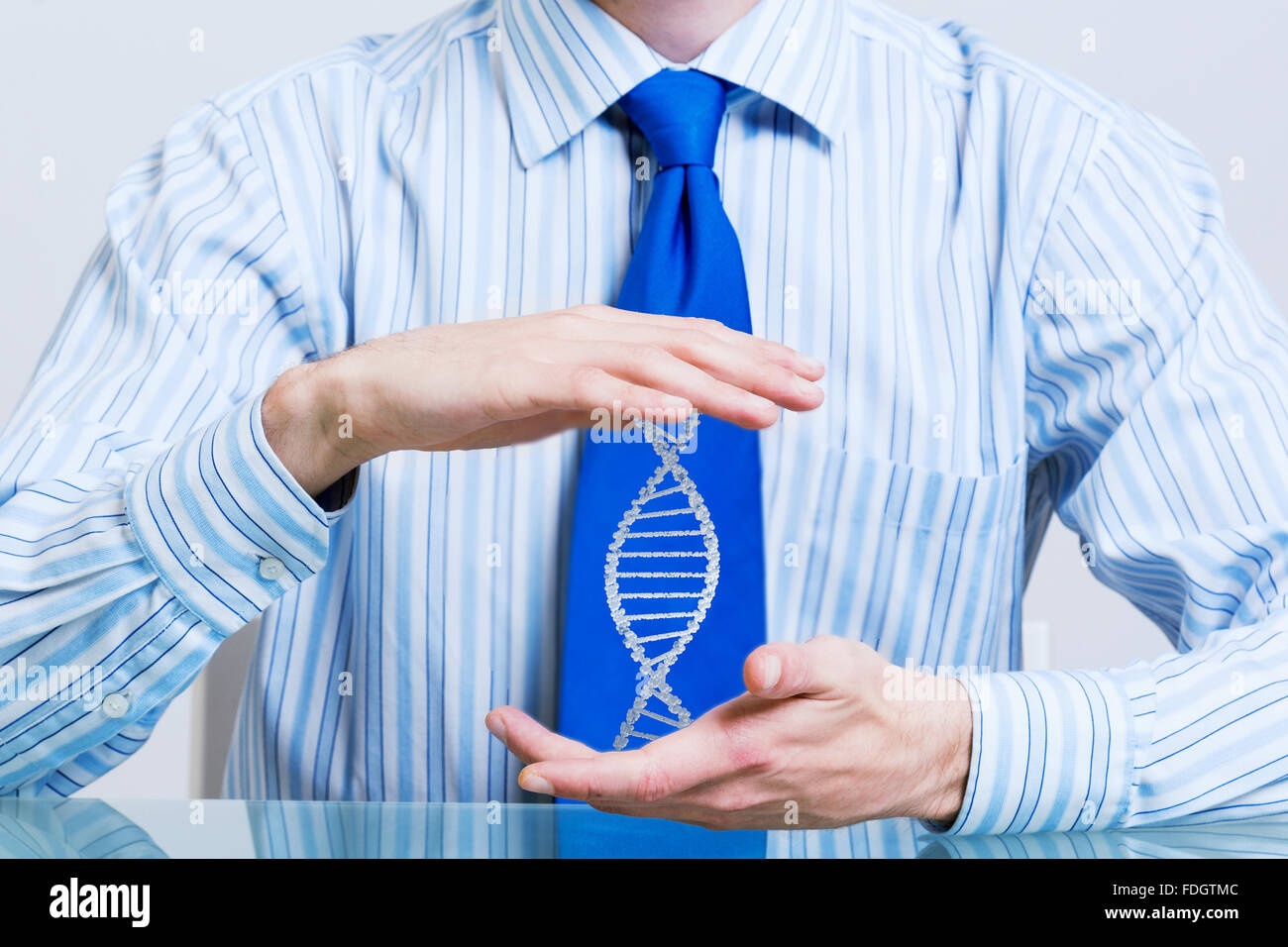 Hands of businessman holding with care molecule concept Stock Photo - Alamy