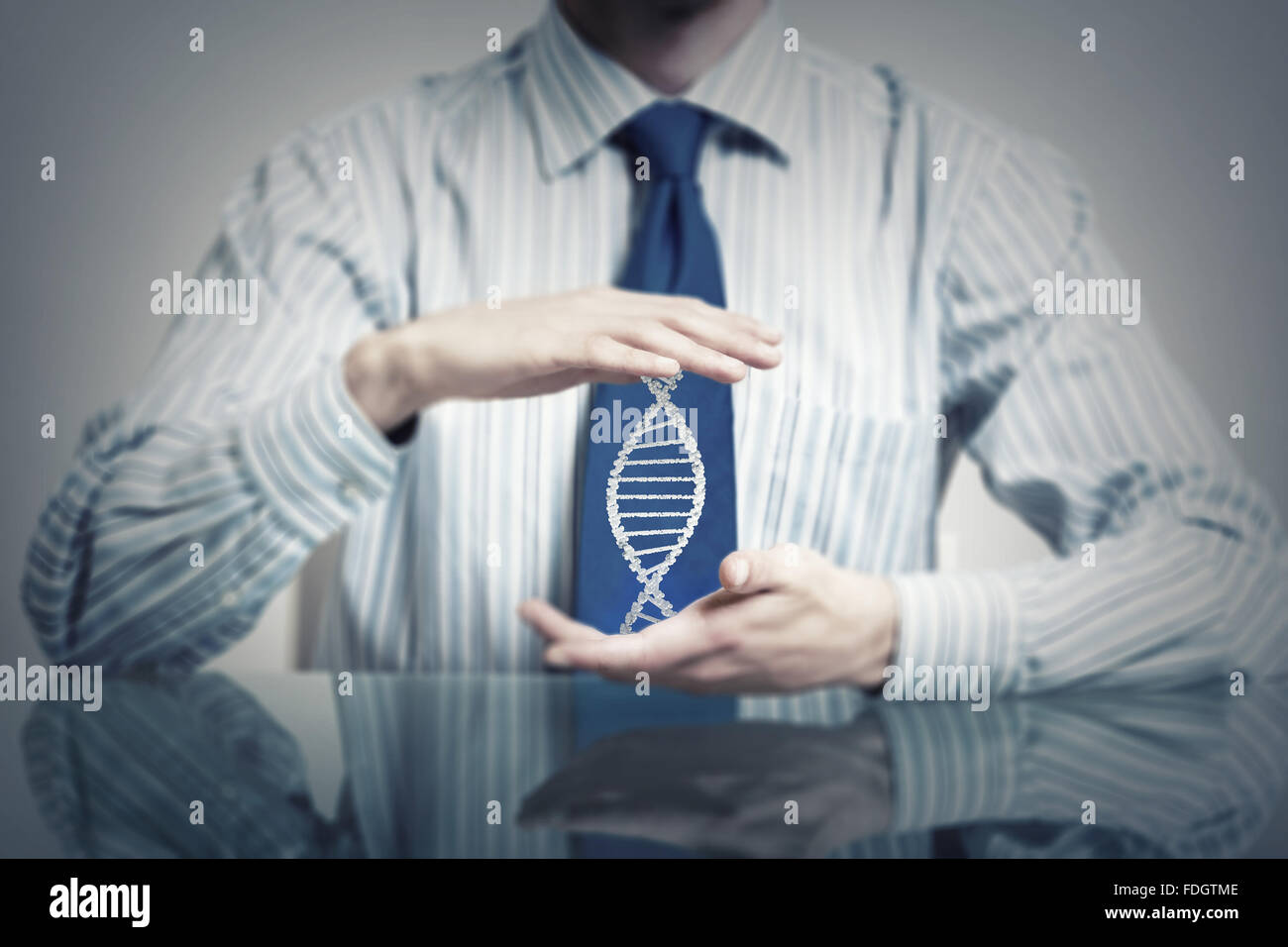 Hands of businessman holding with care molecule concept Stock Photo - Alamy