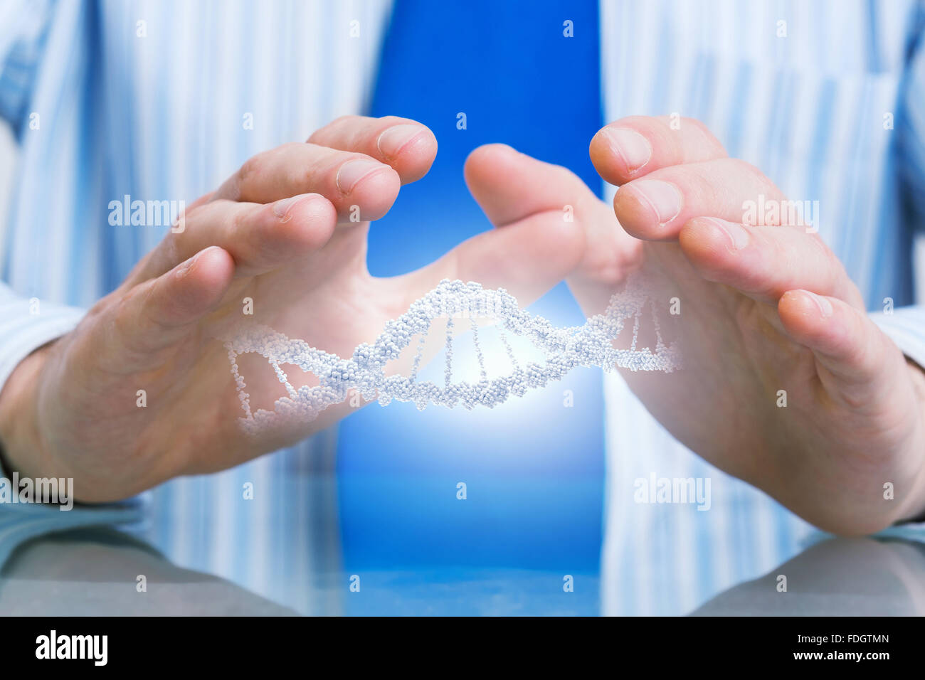 Hands of businessman holding with care molecule concept Stock Photo - Alamy