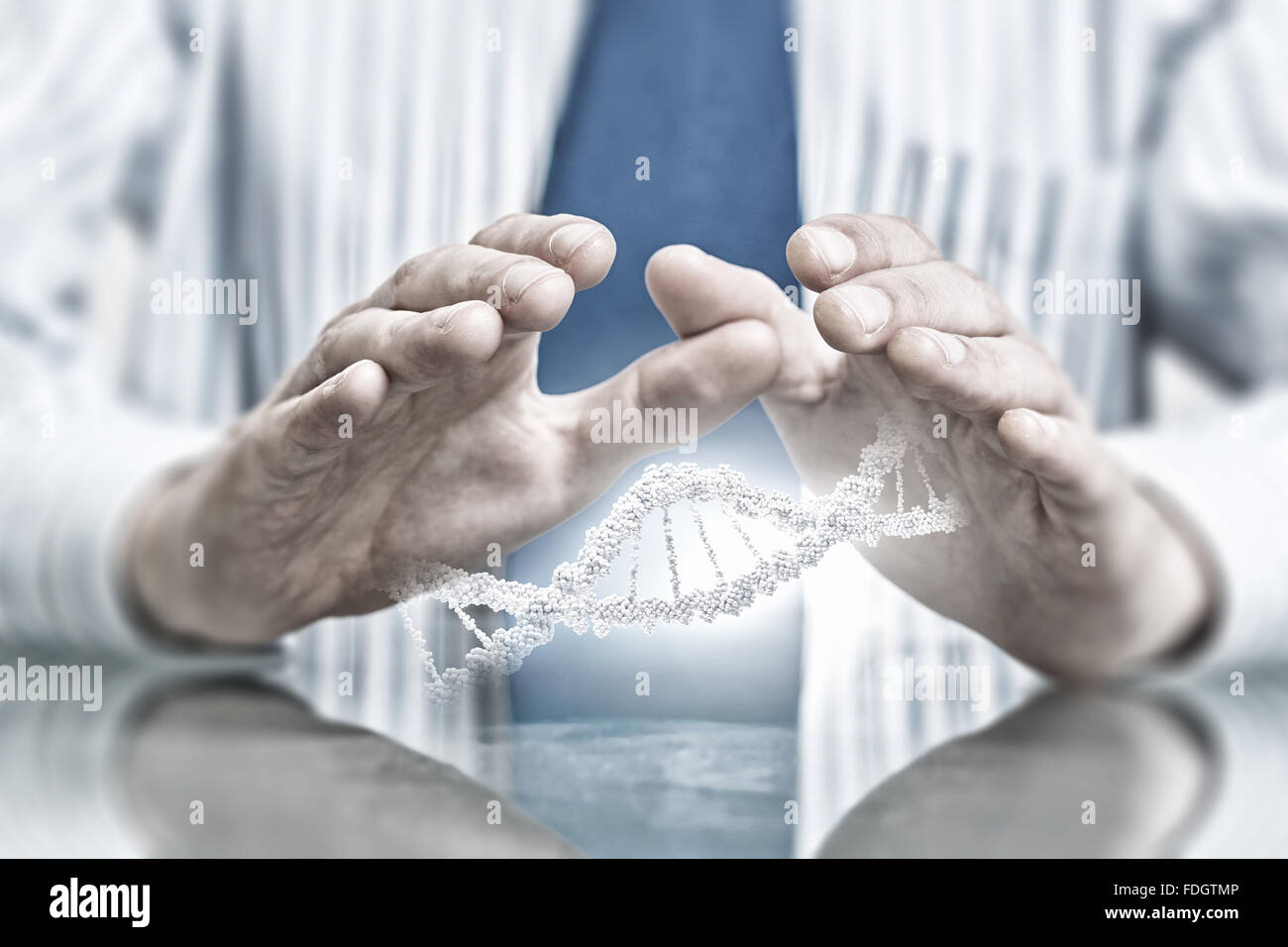 Hands of businessman holding with care molecule concept Stock Photo - Alamy