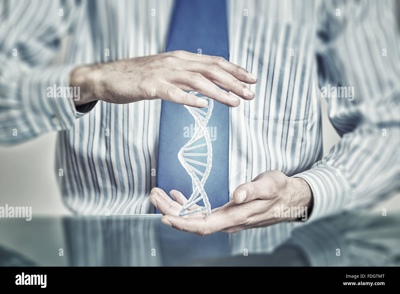 Hands of businessman holding with care molecule concept Stock Photo - Alamy