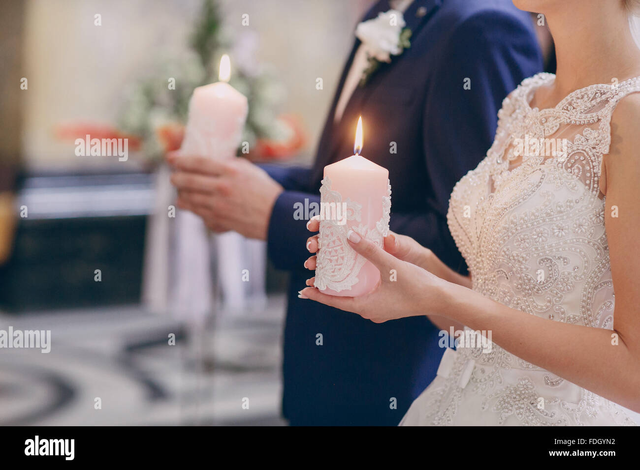hands candle church wedding Stock Photo Alamy