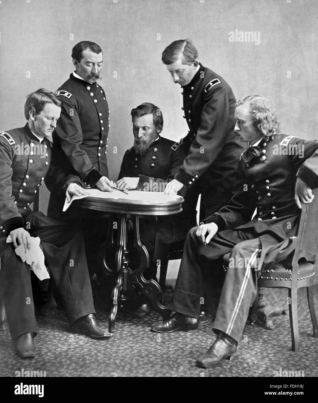 American Civil War photograph showing Union Army Generals Wesley Merritt, Philip Sheridan, George Crook, James William Forsyth, and George Armstrong Custer. First published in Harper's Weekly, June 24 1865 Stock Photo