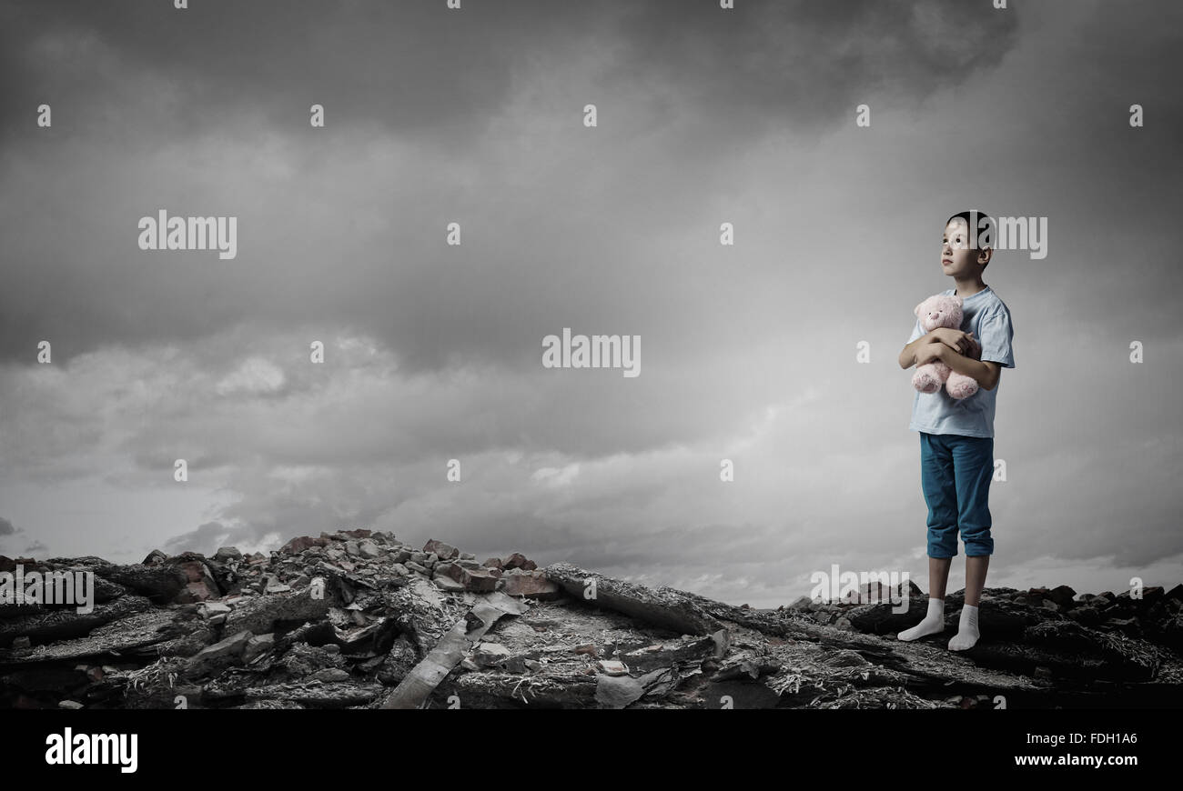 Cute little boy with toy bear in night darkness Stock Photo - Alamy