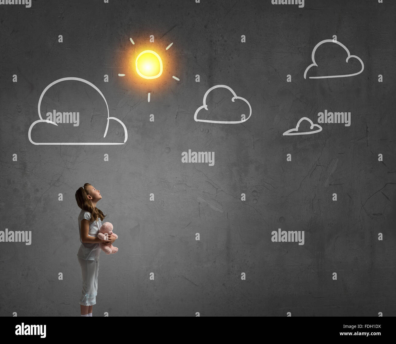 Cute girl wearing pajamas with toy bear in hand Stock Photo - Alamy