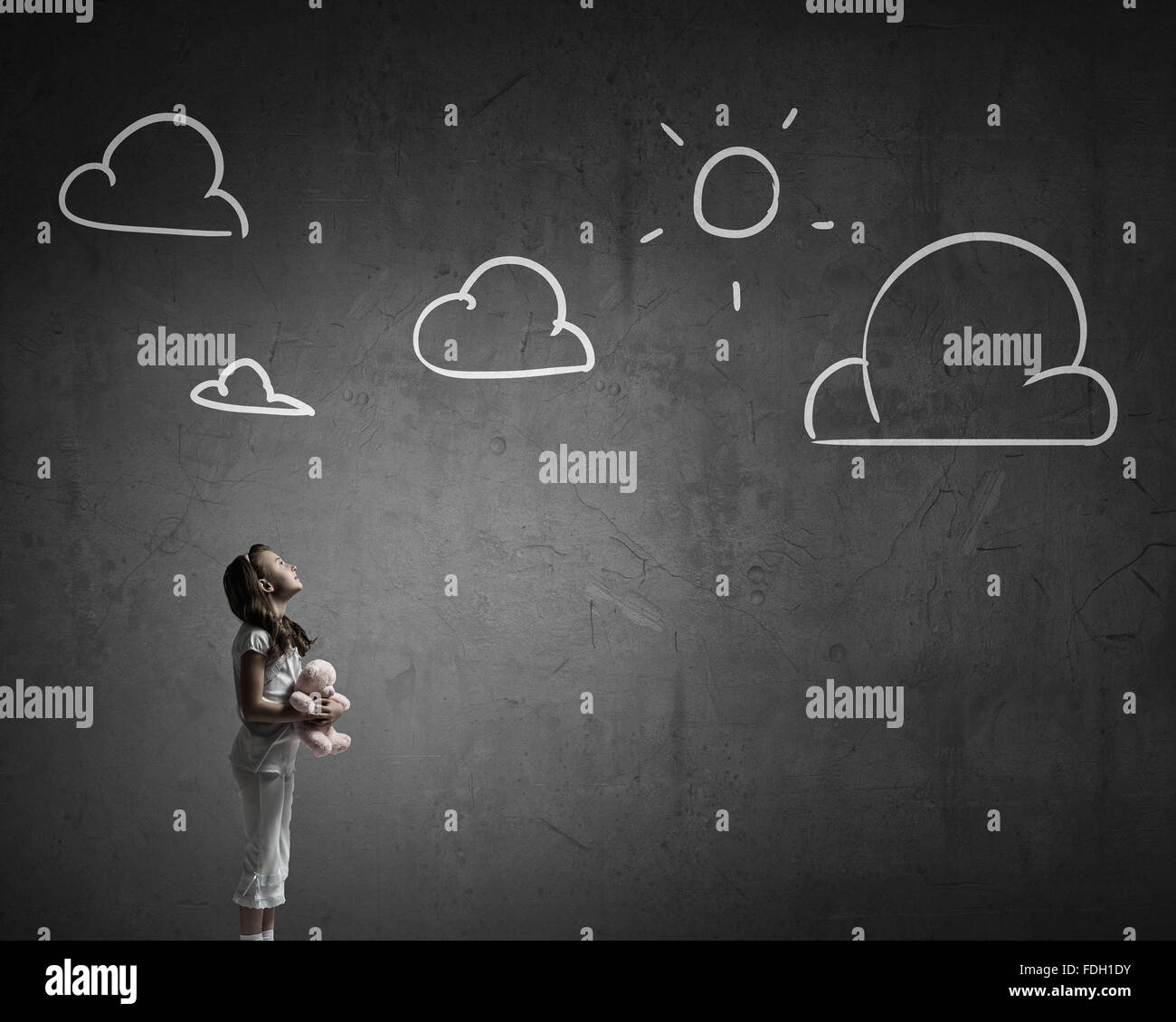 Cute girl wearing pajamas with toy bear in hand Stock Photo - Alamy