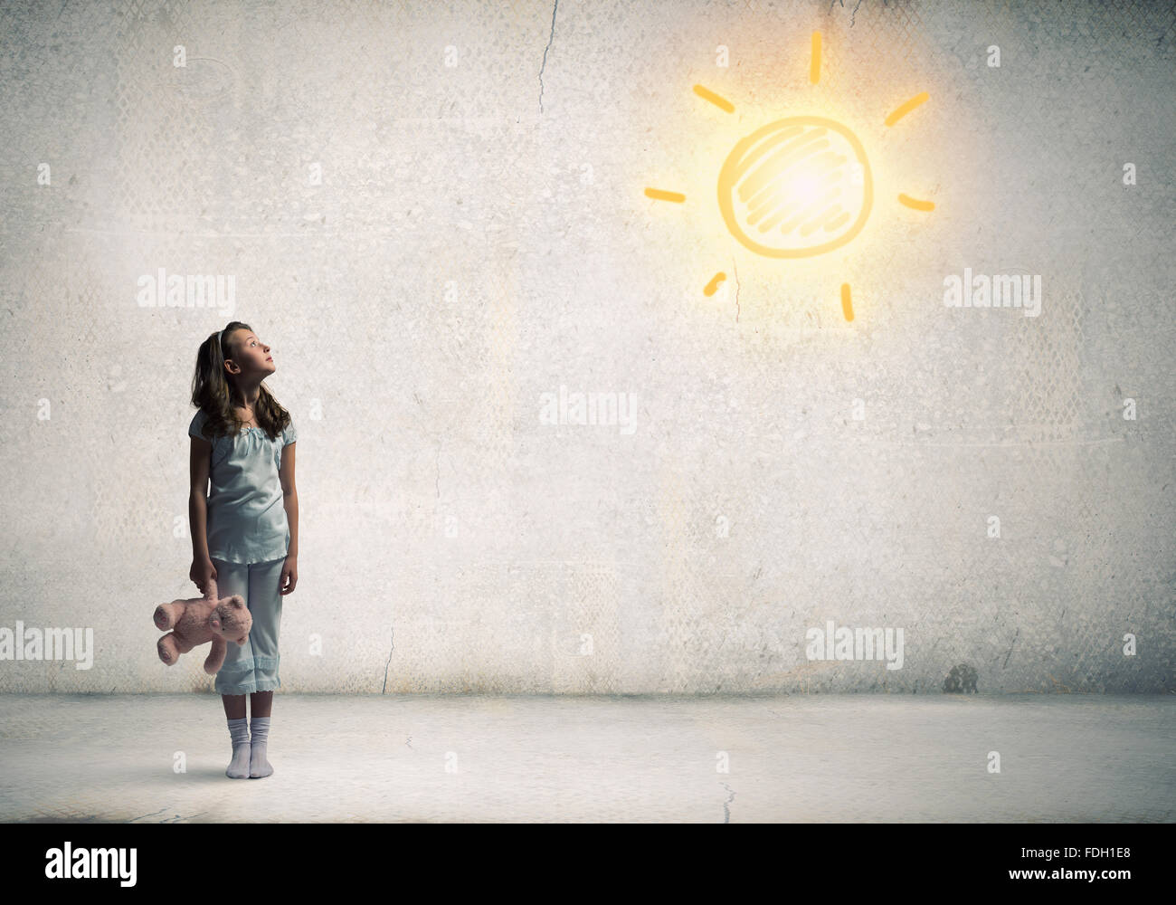 Cute girl wearing pajamas with toy bear in hand Stock Photo - Alamy