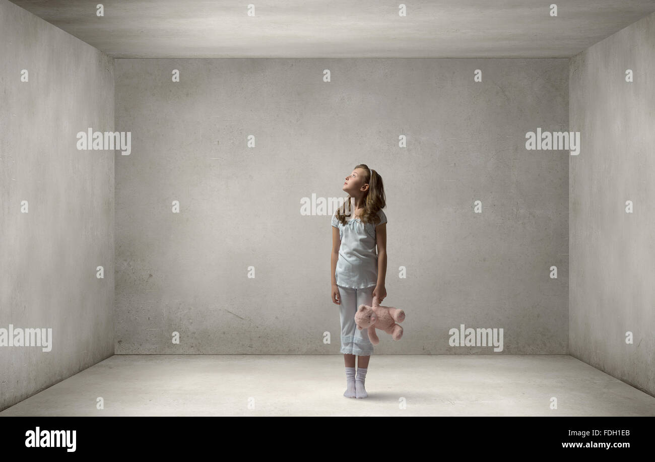 Cute girl wearing pajamas with toy bear in hand Stock Photo - Alamy