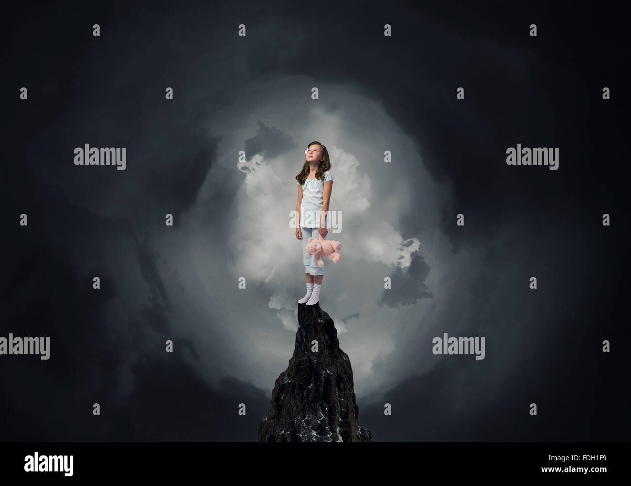Cute girl wearing pajamas with toy bear in hand Stock Photo - Alamy