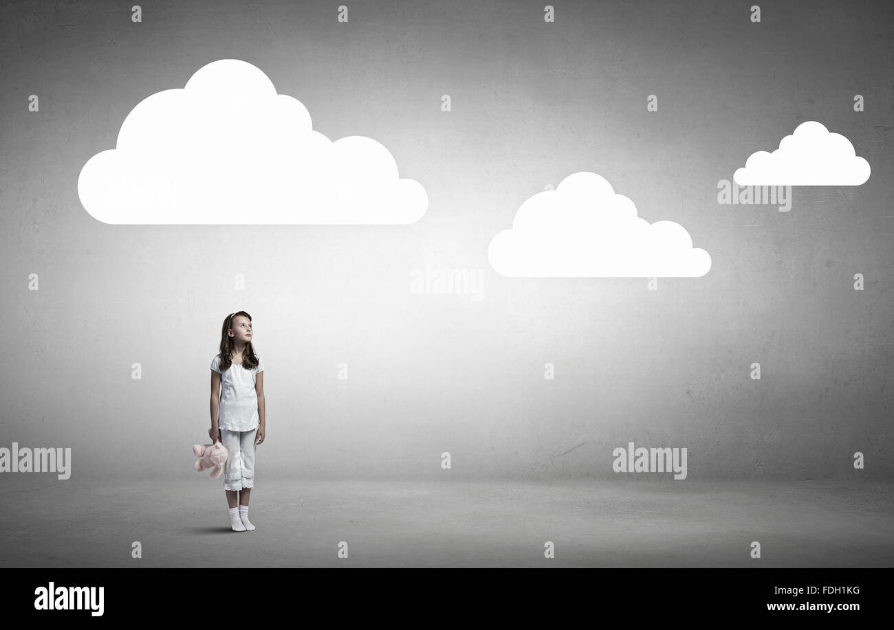 Cute girl wearing pajamas with toy bear in hand Stock Photo - Alamy