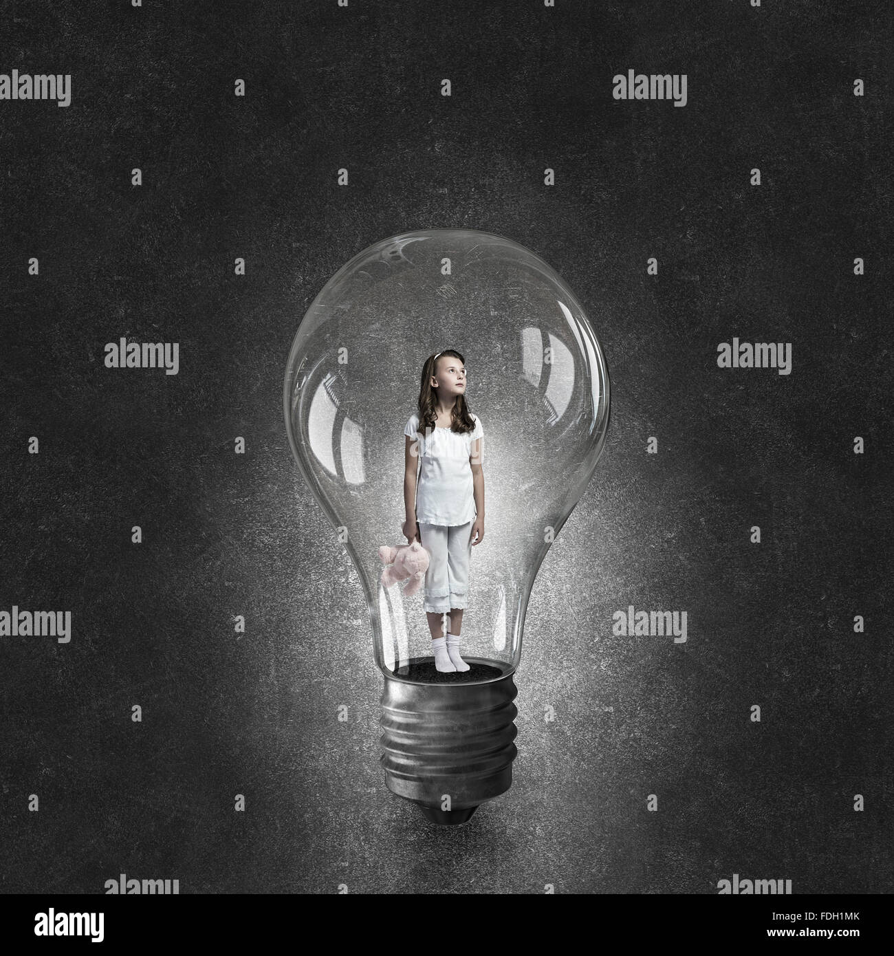 Cute girl wearing pajamas with toy bear in hand Stock Photo - Alamy